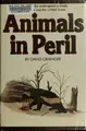 Cover image for Animals in peril